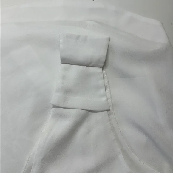 Banana Republic White Sleeveless Top V Neck
Polished Staple Petite Large - Picture 2 of 9